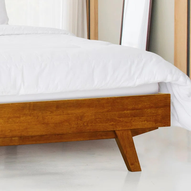 Modern bedroom interior with wooden platform bed