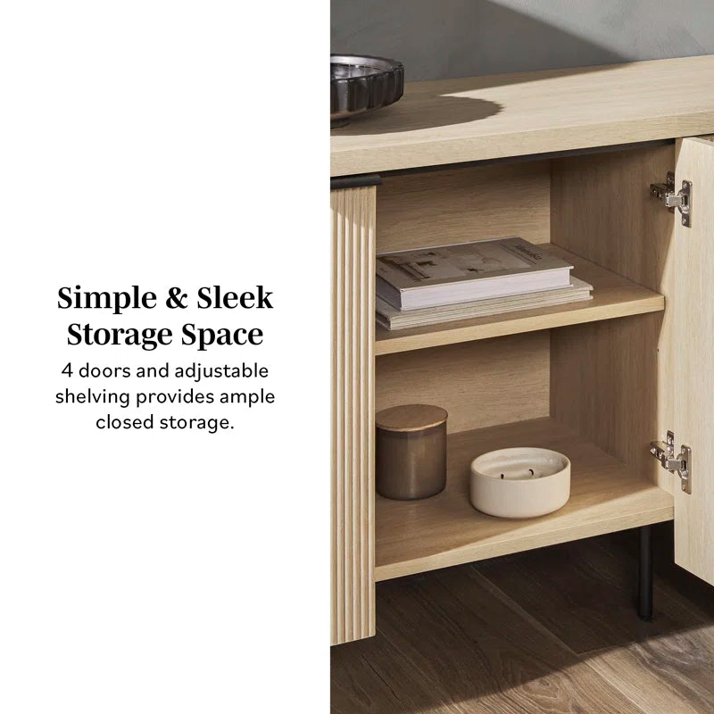 Wooden media console cabinet with fluted front and metal legs
