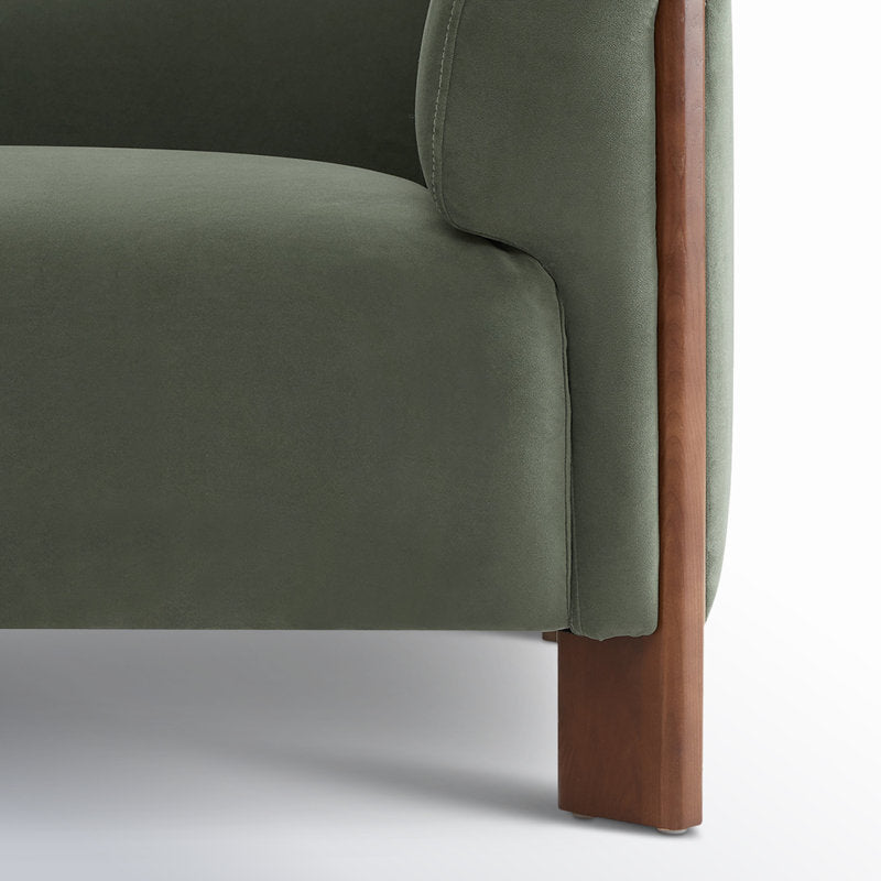 Comfortable olive green armchair for modern interiors
