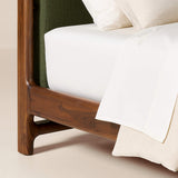 Premium upholstered bed crafted from solid teak wood