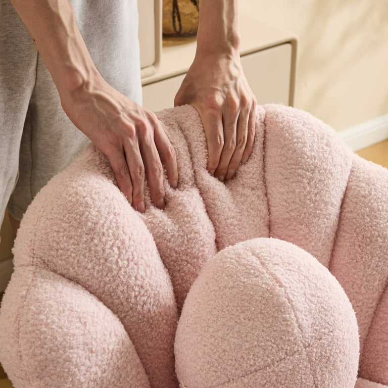Pink designer chair with round cushion