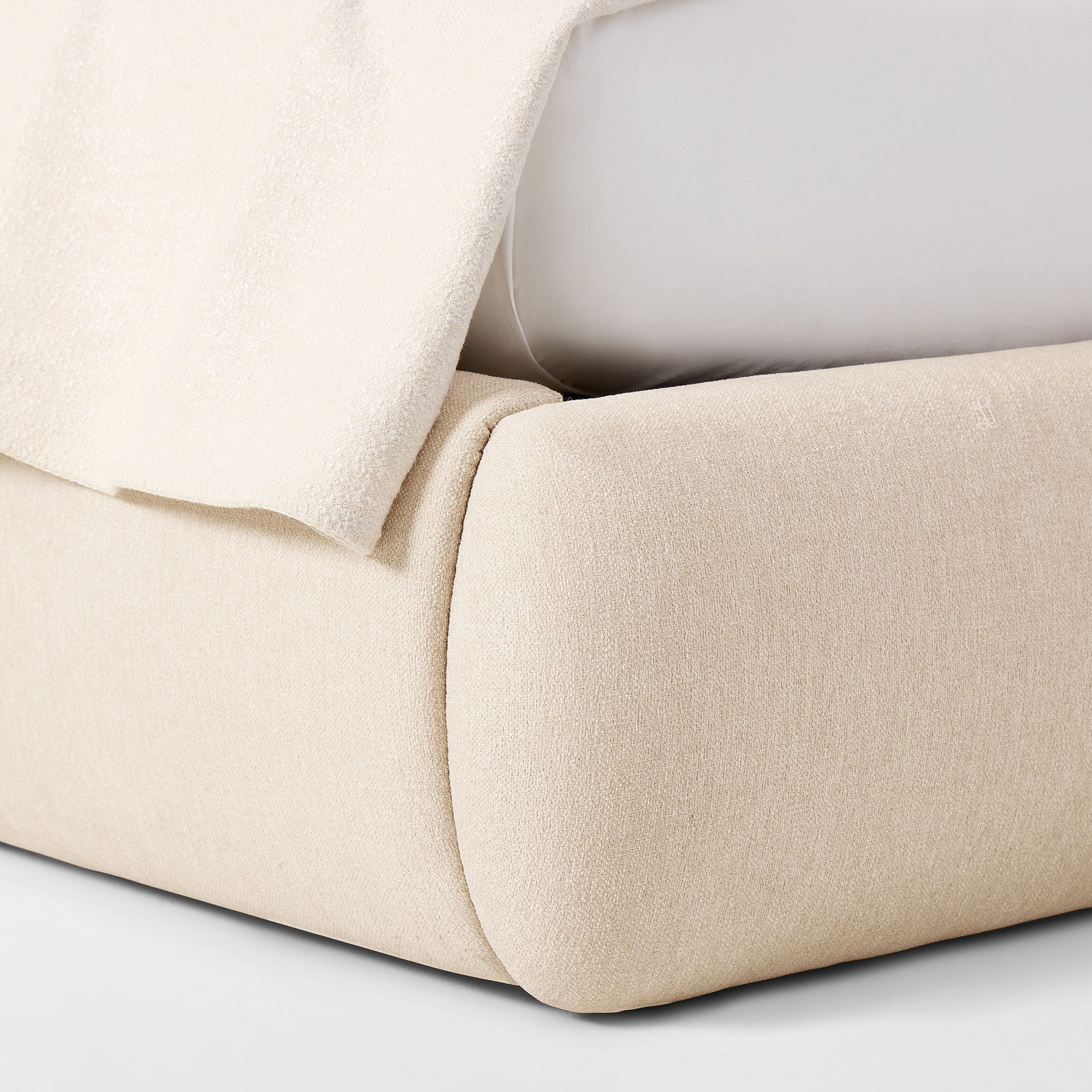 Designer bedroom bed with soft cushioned headboard