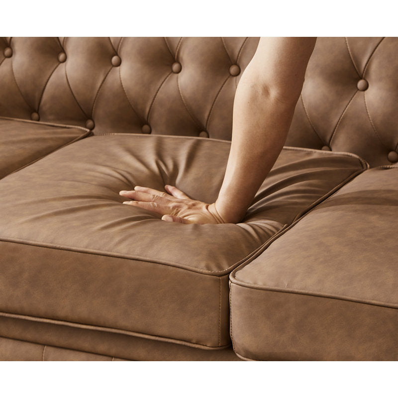 Classic tufted teak wood sofa with rolled arms and nailhead trim