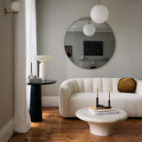 Premium teak wood sofa upholstered in ivory bouclé fabric