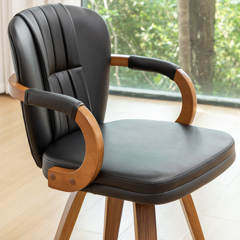 Luxury black upholstered teak wood armchair