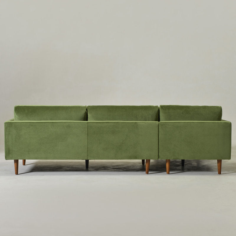 Modern teak wood green velvet sofa with right chaise lounge