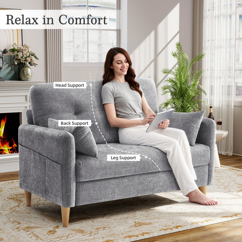 Stylish compact loveseat sofa with side pockets