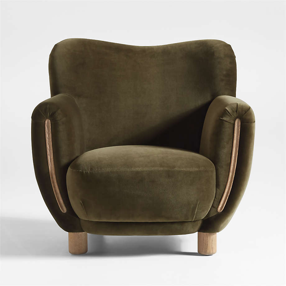 Comfortable upholstered reading chair with wooden legs