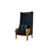 Royal accent chair in black velvet with carved teak wood armrests