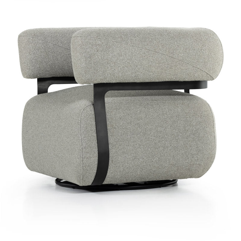 Luxury curved armchair with soft fabric upholstery