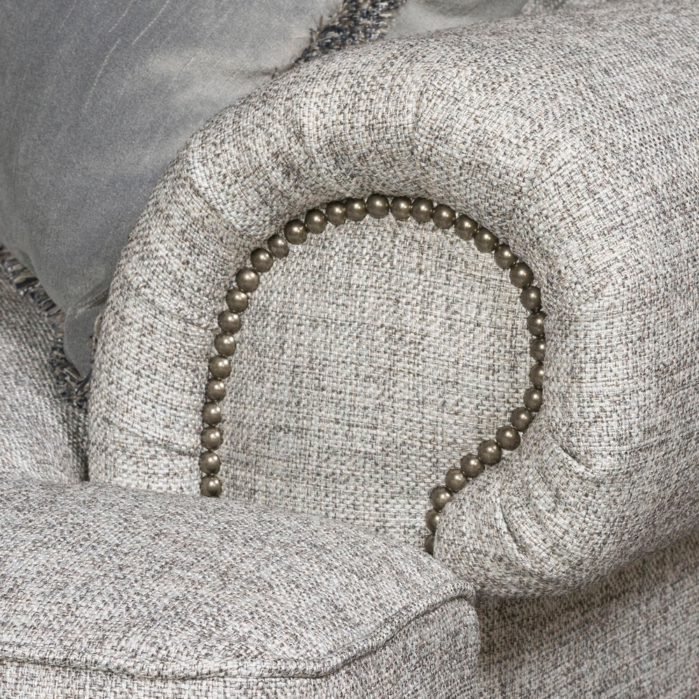 "Modern classic fabric sofa with nailhead detailing"