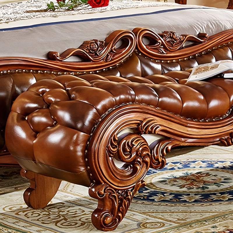 Chesterfield leather bench with carved wooden frame