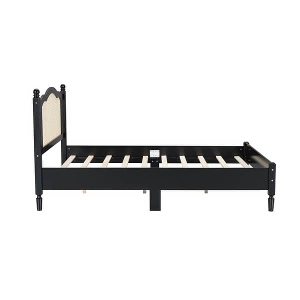 Stylish wooden bed with woven cane headboard