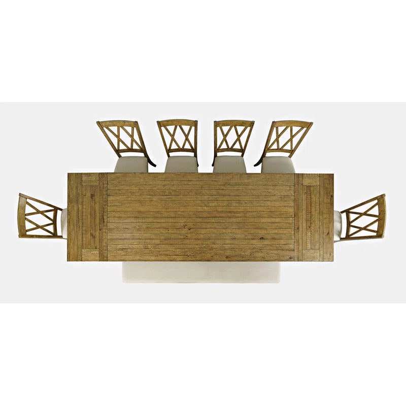 Solid wood dining table with cushioned chairs