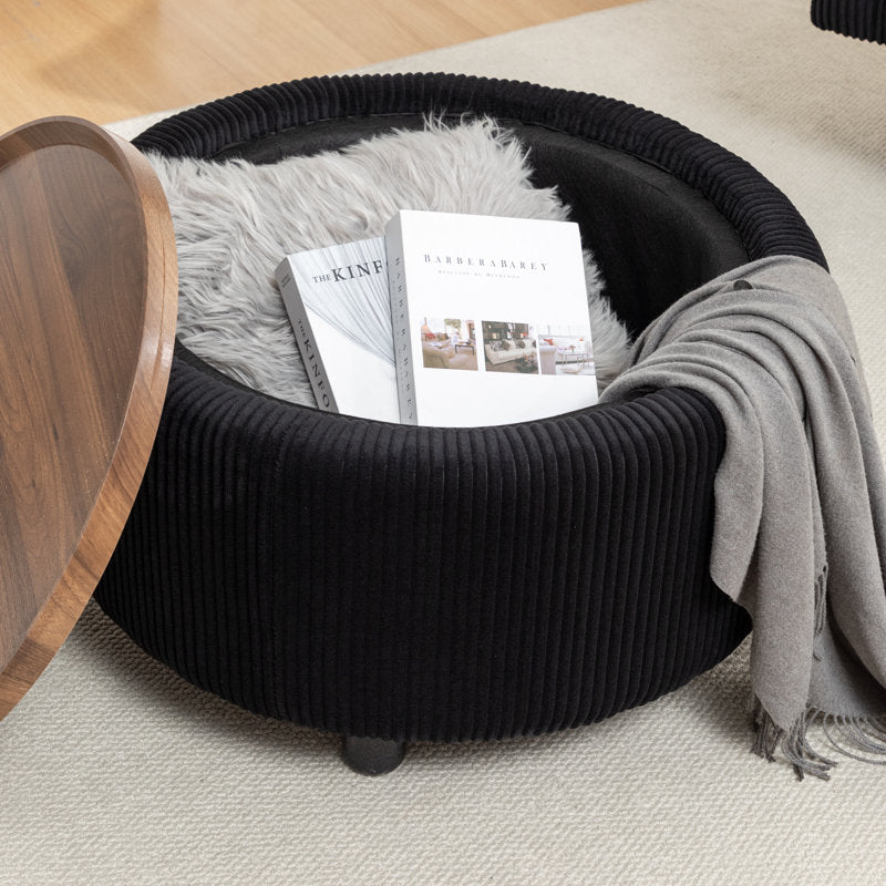 Upholstered black ottoman coffee table with teak wood tray top