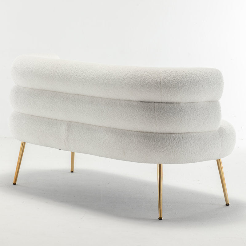 Modern bouclé loveseat sofa with curved back and gold legs