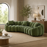 Green curved cloud sectional sofa in bouclé fabric with teak wood frame