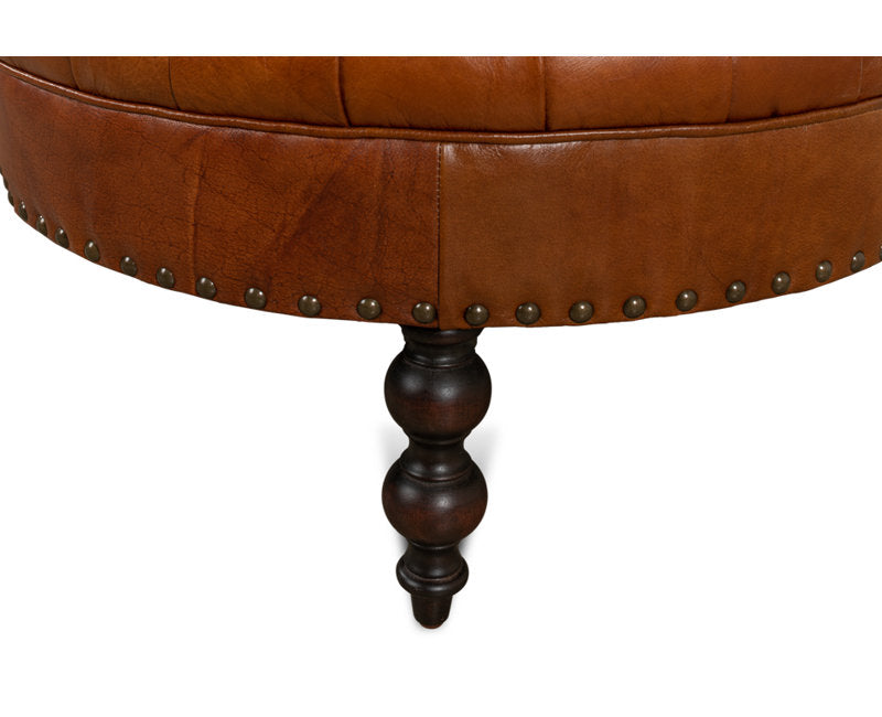 Handcrafted leather lounge chair with button tufting
