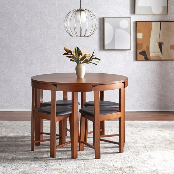 Elegant round dining table set for small spaces
