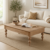 Solid teak wood coffee table with turned legs in living room