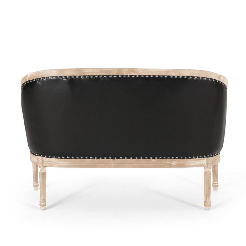 Classic black tufted loveseat with carved wooden frame