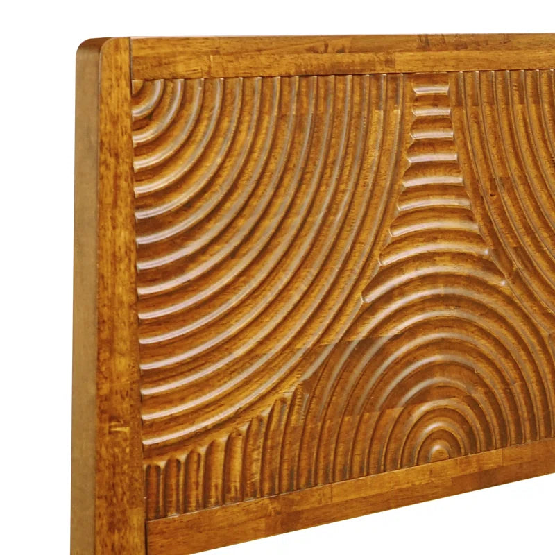 Luxury wooden bed with artistic headboard pattern