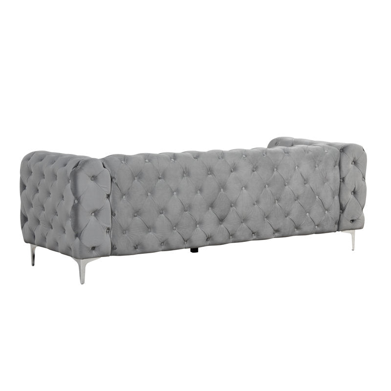 Modern luxury tufted sofa crafted from solid teak wood