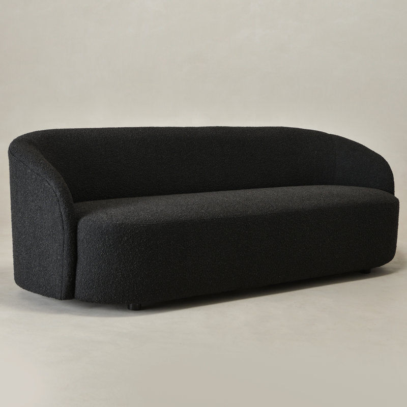 Stylish curved black sofa with teak wood construction