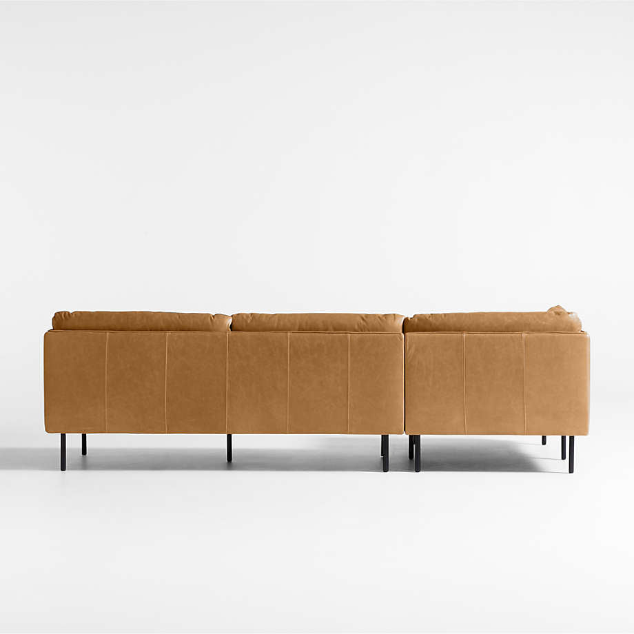 Designer leather sofa with metal legs