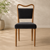 Solid teak wood dining chair with black upholstered seat
