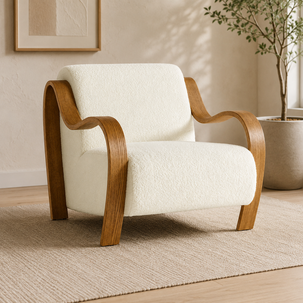 Modern teak wood lounge chair with curved arms and white upholstery