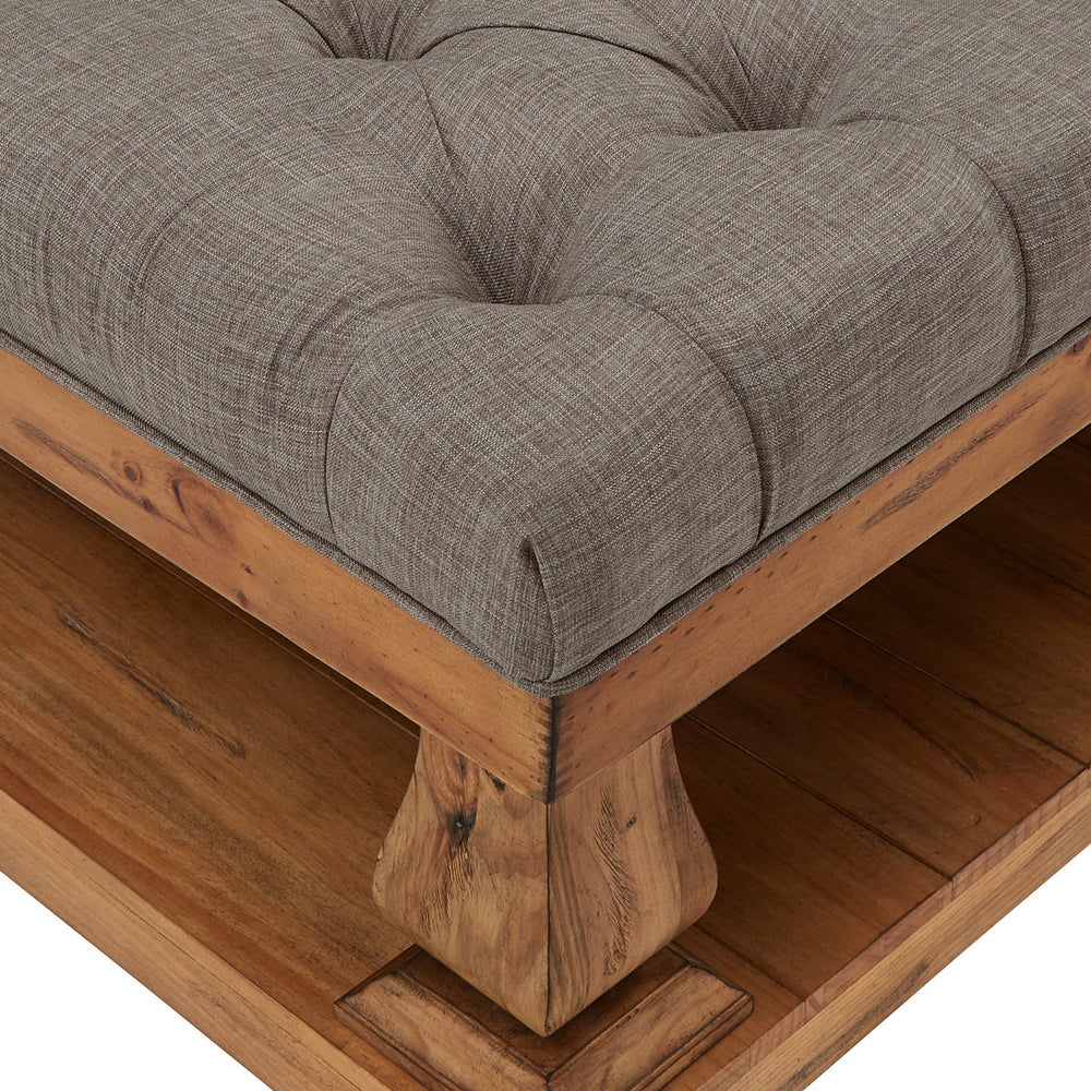 Elegant upholstered coffee table with handcrafted wooden frame