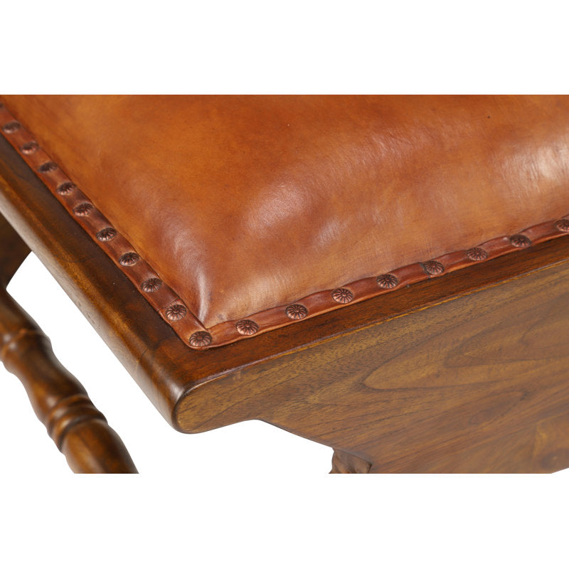 Traditional wooden armchair with footstool