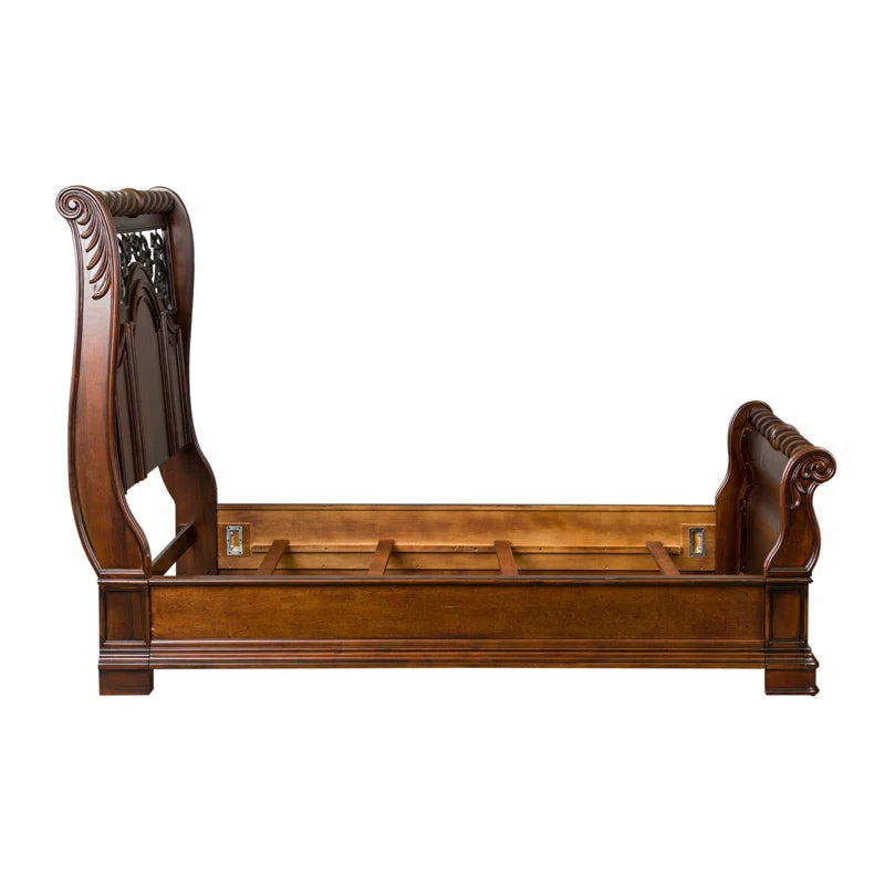 Vintage style bed with carved headboard