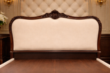 Upholstered headboard king size wooden bed with elegant walnut finish
