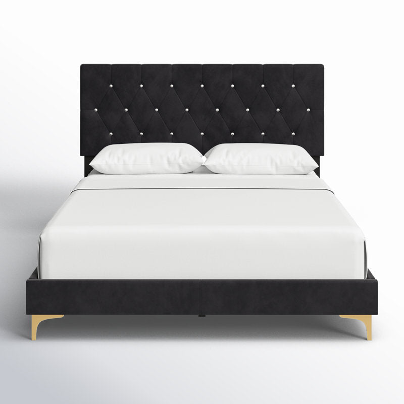 Modern black upholstered bed frame with gold legs