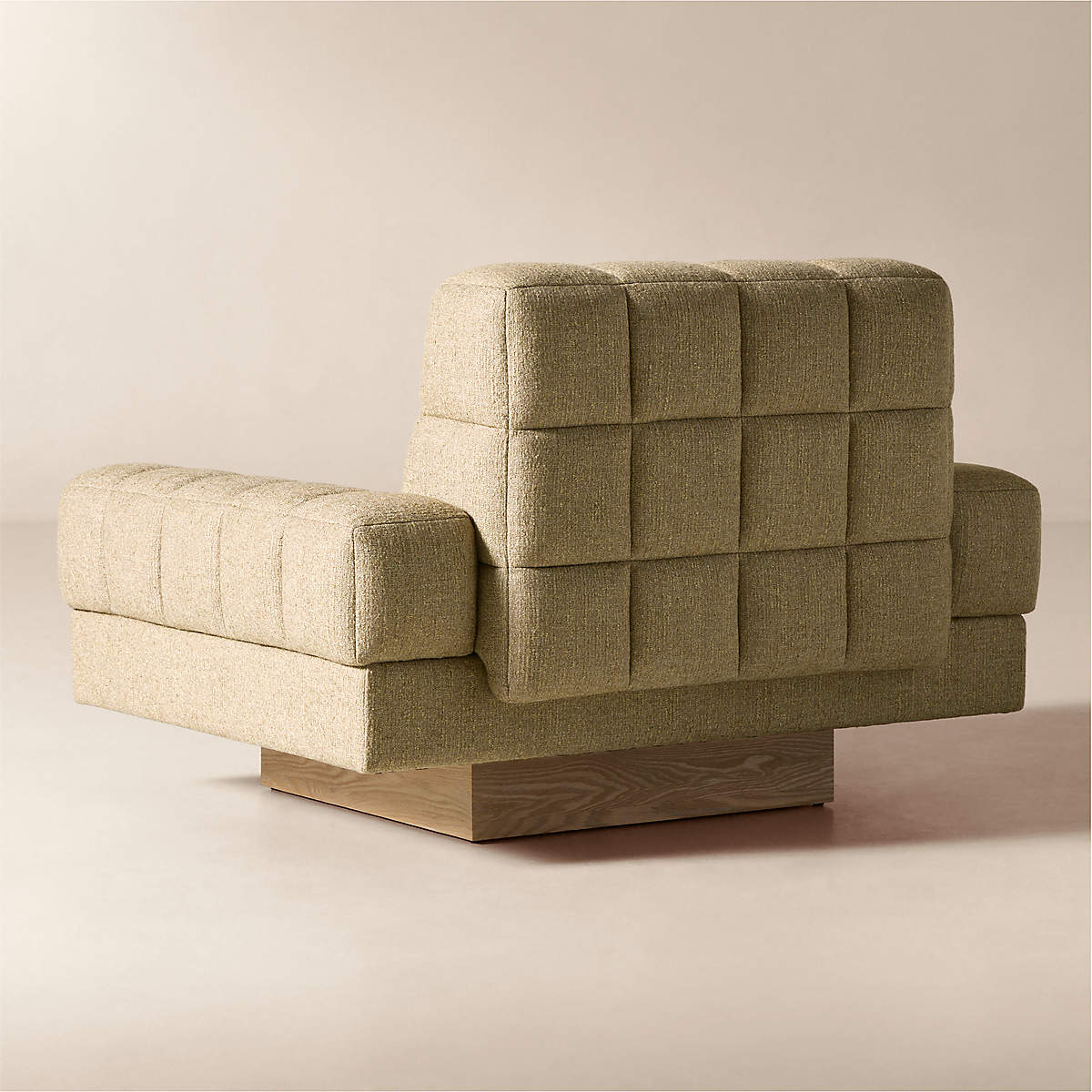 Designer accent chair with textured fabric upholstery