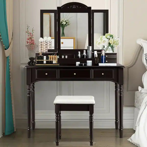 Makeup table with foldable mirror panels