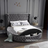round platform bed with padded headboard

