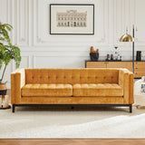 Luxury velvet sofa with teak wood frame and button tufting