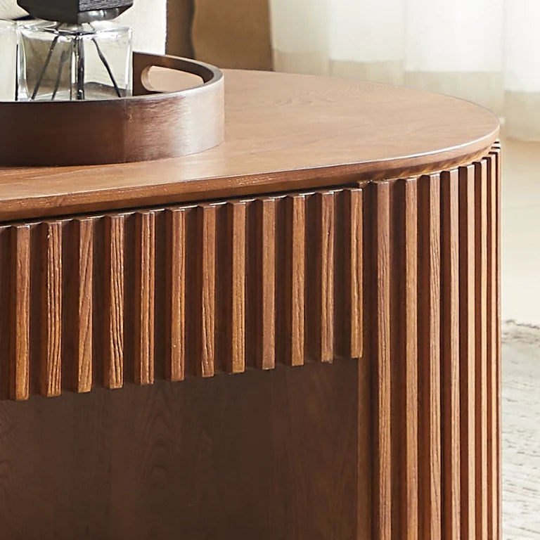 Walnut brown coffee table with sculptural fluted base