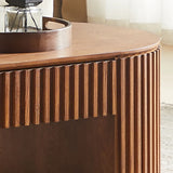 Walnut brown coffee table with sculptural fluted base
