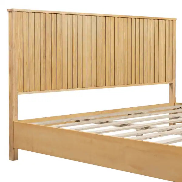 Natural wood bed frame with soft bedding setup
