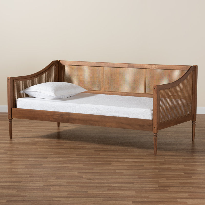Wooden day bed with natural cane panels