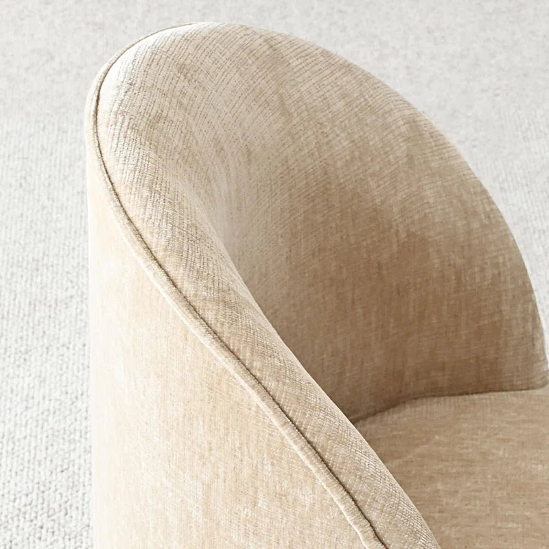 Scandinavian style round dining table with fabric chairs